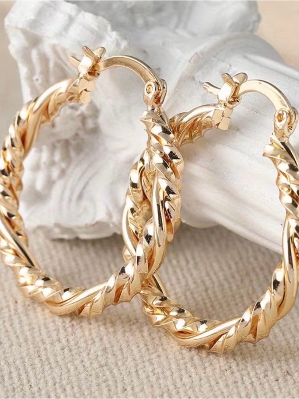 Gold tone minimalist Twisted Metal Hoop Earrings -
